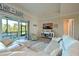 Relaxing living room featuring a sectional sofa and access to a back patio at 6248 Champions Row, Bradenton, FL 34210