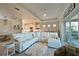 Open concept living area with white sectional sofa and hardwood floors at 6248 Champions Row, Bradenton, FL 34210