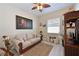 Cozy office features a comfortable sofa and built-in shelving at 6248 Champions Row, Bradenton, FL 34210