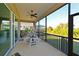 Spacious screened porch, great for outdoor dining at 6248 Champions Row, Bradenton, FL 34210