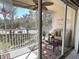 Relaxing screened balcony overlooking a lush green landscape at 7225 Cedar Hollow Cir # 20-201, Bradenton, FL 34203