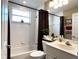 Well-appointed bathroom with tub, shower, and updated fixtures at 7225 Cedar Hollow Cir # 20-201, Bradenton, FL 34203