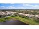 Aerial view of property highlighting its lakefront position at 7584 Andora Dr, Sarasota, FL 34238