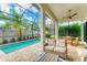 Private pool and screened patio with seating area at 1049 River Wind Cir, Bradenton, FL 34212