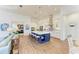 Spacious kitchen with island, stainless steel appliances, and white cabinetry at 1049 River Wind Cir, Bradenton, FL 34212