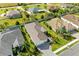 Luxury home with tile roof and a large backyard at 1049 River Wind Cir, Bradenton, FL 34212