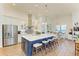 Bright kitchen boasts stainless steel appliances and a large center island at 1049 River Wind Cir, Bradenton, FL 34212