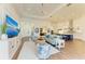 Open concept living room and kitchen with hardwood floors and stylish furnishings at 1049 River Wind Cir, Bradenton, FL 34212