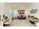 Bright home office with two desks, plenty of natural light, and hardwood floors at 1049 River Wind Cir, Bradenton, FL 34212