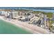 Gorgeous aerial view of beachside condo buildings, oceanfront, and beachfront access at 1102 Benjamin Franklin Dr # 409, Sarasota, FL 34236