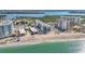 Gorgeous aerial view of the beachfront condos, the Gulf, and nearby residential areas at 1102 Benjamin Franklin Dr # 409, Sarasota, FL 34236