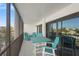 The cozy screened balcony has comfortable outdoor seating and gorgeous ocean views at 1102 Benjamin Franklin Dr # 409, Sarasota, FL 34236