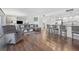 Open-concept living area with modern furnishings, breakfast bar and seamless flow for entertaining at 1102 Benjamin Franklin Dr # 409, Sarasota, FL 34236