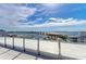 Spacious rooftop deck offering panoramic water and city views at 111 Golden Gate Pt # 402, Sarasota, FL 34236