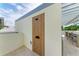 Private outdoor shower near grilling area at 111 Golden Gate Pt # 402, Sarasota, FL 34236