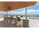 Enjoy water views from this rooftop bar with seating for many at 111 Golden Gate Pt # 402, Sarasota, FL 34236