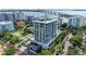 Modern building near waterfront, featuring a pool at 111 Golden Gate Pt # 402, Sarasota, FL 34236