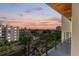 Balcony offering stunning sunset and city views at 111 Golden Gate Pt # 402, Sarasota, FL 34236