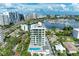 Modern highrise building with pool and marina views at 111 Golden Gate Pt # 402, Sarasota, FL 34236