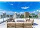 Enjoy breathtaking city views from this rooftop terrace with fire pit at 111 Golden Gate Pt # 402, Sarasota, FL 34236