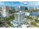 Luxury condo building with pool and waterfront views at 111 Golden Gate Pt # 402, Sarasota, FL 34236
