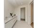 Modern bathroom with double vanity and ample counter space at 111 Golden Gate Pt # 402, Sarasota, FL 34236