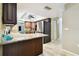 Spacious kitchen with stainless steel appliances, granite countertops, and ample cabinet space at 117 Hillcrest Dr, Bradenton, FL 34209