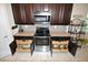 Spacious kitchen with granite countertops, stainless steel appliances, and ample drawers at 135 Ventosa Pl, Nokomis, FL 34275