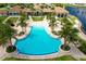 Expansive resort-style pool with patio and lounge chairs at 135 Ventosa Pl, Nokomis, FL 34275
