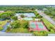 Aerial view of community pool and tennis courts at 1446 56Th W St # 1446, Bradenton, FL 34209