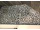 Shower floor with pebble mosaic tile at 1446 56Th W St # 1446, Bradenton, FL 34209