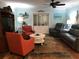 Relaxing living room featuring comfortable seating and coastal decor at 1446 56Th W St # 1446, Bradenton, FL 34209