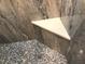 Corner shower with built-in seat and pebble tile floor at 1446 56Th W St # 1446, Bradenton, FL 34209