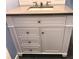 White vanity with grey countertop and silver knobs at 1446 56Th W St # 1446, Bradenton, FL 34209