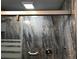 Shower with marble tile, glass door, and built-in seat at 1446 56Th W St # 1446, Bradenton, FL 34209