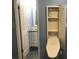 Bathroom with built-in ironing board and vanity at 1446 56Th W St # 1446, Bradenton, FL 34209