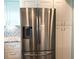 Stainless steel refrigerator in updated kitchen at 1446 56Th W St # 1446, Bradenton, FL 34209