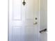 White door with brass hardware and a wooden handrail at 1446 56Th W St # 1446, Bradenton, FL 34209