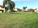 Expansive green lawn area in the community at 1446 56Th W St # 1446, Bradenton, FL 34209