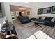 Open living room with comfortable seating and natural light at 1508 Pelican Cove Rd # Gr233, Sarasota, FL 34231