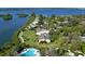 Community overview showcasing lush landscaping and waterfront access at 1508 Pelican Cove Rd # Gr233, Sarasota, FL 34231