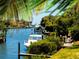 Scenic canal-front property with boats at 1610 Hudson Pointe Dr, Sarasota, FL 34236