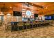 Well-appointed bar area with stylish decor, ample seating, and a wide selection of beverages at 16112 Isola Pl, Bradenton, FL 34211