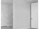 A hallway with white walls and doors at 16112 Isola Pl, Bradenton, FL 34211