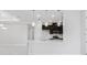 Bright modern kitchen with pendant lighting, white countertops, and stainless steel appliances at 16112 Isola Pl, Bradenton, FL 34211