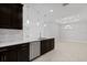 Modern kitchen featuring stainless steel appliances and a white countertop at 16112 Isola Pl, Bradenton, FL 34211