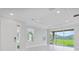 Bright, airy living room with a sliding glass door that opens to the backyard at 16112 Isola Pl, Bradenton, FL 34211