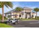 Modern sports center featuring a dedicated golf cart parking area and a stylish, contemporary design at 16112 Isola Pl, Bradenton, FL 34211