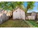 Rustic wooden shed nestled in a backyard with wooden fences at 1742 Adams S Cir, Largo, FL 33771