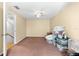 Empty bedroom with ceiling fan and carpet flooring at 1742 Adams S Cir, Largo, FL 33771